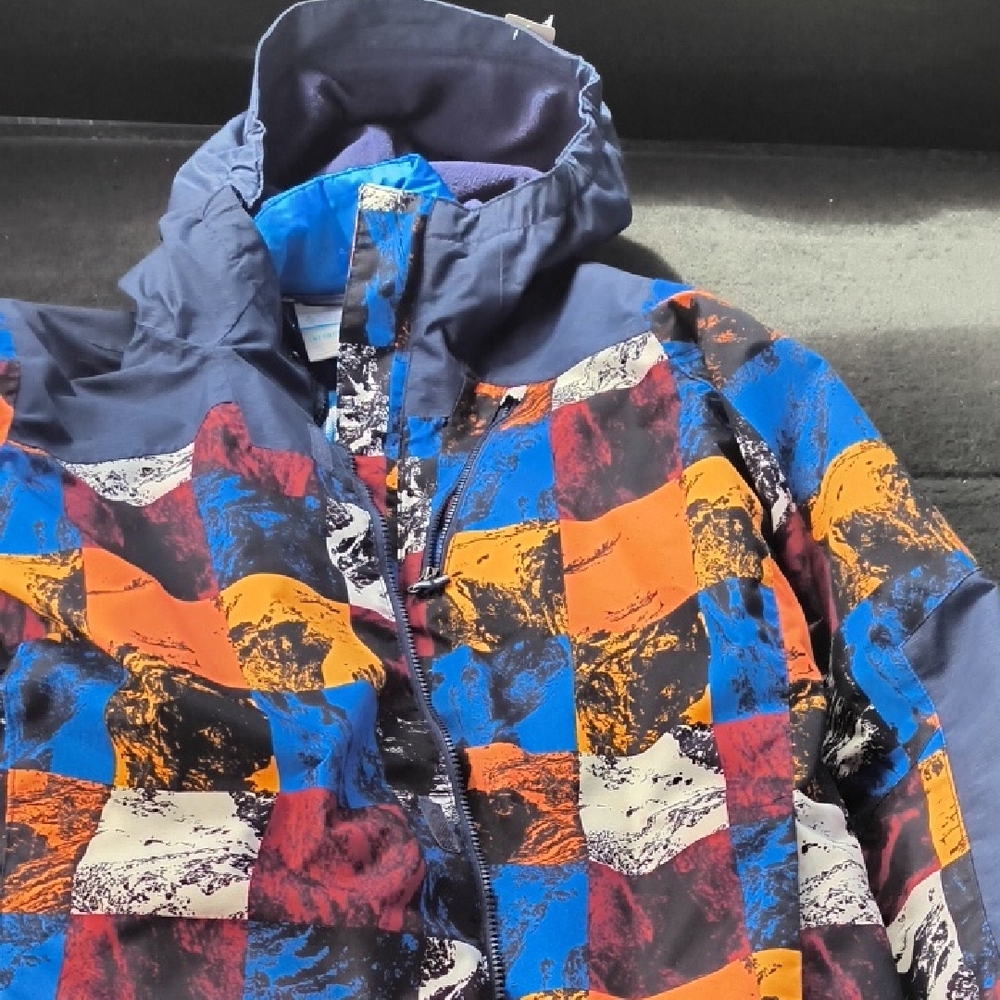 Columbia Blue and Orange Puffer Jacket with Geometric Design